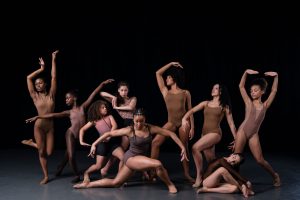 Shades Dancewear Ambassadors - a group of diverse dancers, a mix of genders, ages and ethnicities sporting Shades Dancewear, skin-toned dancewear in various shades of brown.