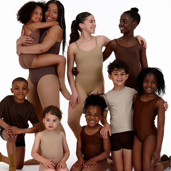 A group of diverse dancers, a range of ages, genders and ethnicities. Each dancer is wearing dancewear of different shades to match thier skin tone to the dancewear. Ranging from Bojangles, Raven, Ailey and Pearl