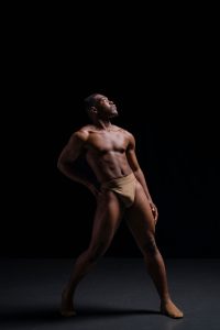 Shades Dancewear Ambassador: black male dancer showcasing a dance support belt