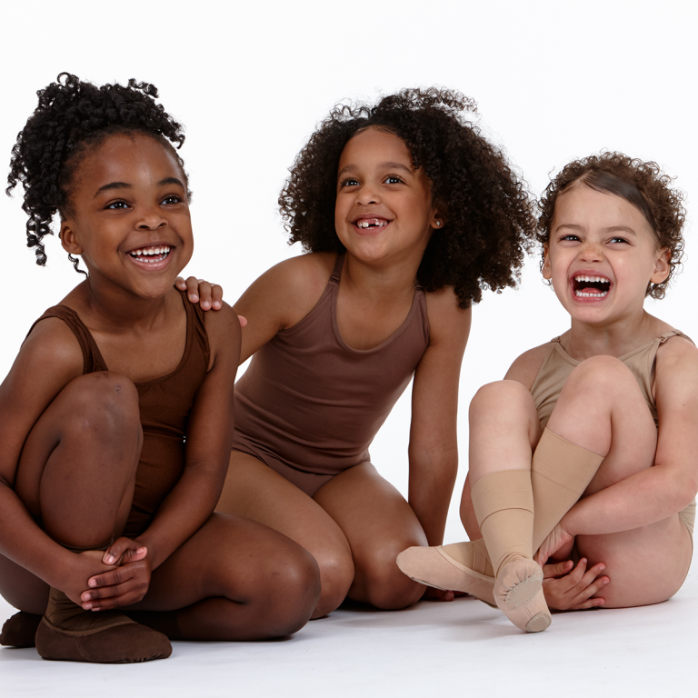 Child Ballet Dancers wearing Skin tone matching dancewear from dark to light tones. Bojangles, Ailey and Pearl shades ballet shoes and convertible tights.